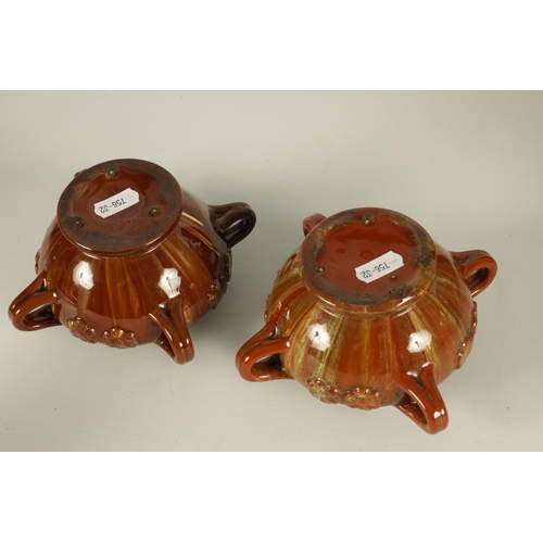 43 - A PAIR OF LATE 19TH CENTURY LINTHORPE LAMP BASES IN THE MANNER OF CHRISTOPHER DRESSER of squat foote... 