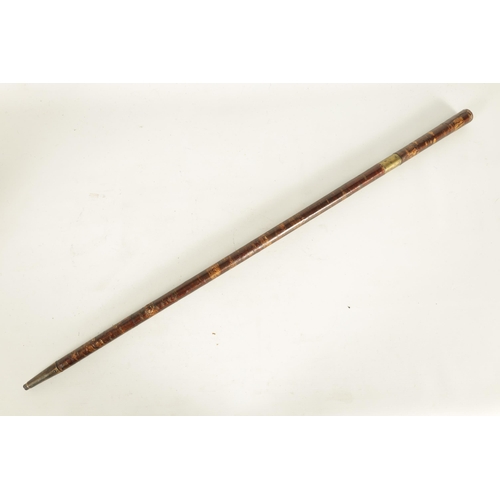 430 - A RARE MEIJI PERIOD JAPANESE SAMURAI SWORD STICK with lacquered stick, the handle enclosing a glazed... 