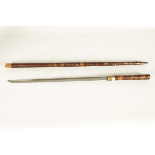 430 - A RARE MEIJI PERIOD JAPANESE SAMURAI SWORD STICK with lacquered stick, the handle enclosing a glazed... 