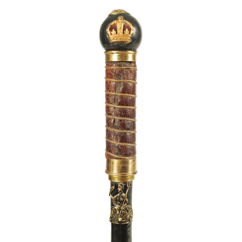 432 - AN EARLY 20TH CENTURY EBONISED AND LEATHER MOUNTED SWORD STICK with brass crown and Britannia mounts... 