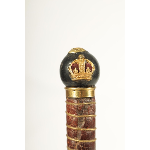 432 - AN EARLY 20TH CENTURY EBONISED AND LEATHER MOUNTED SWORD STICK with brass crown and Britannia mounts... 