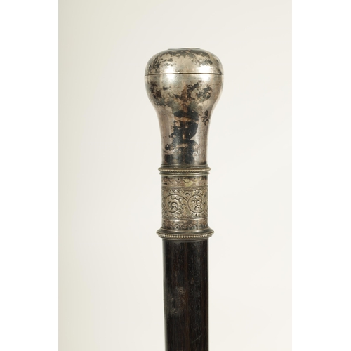 434 - A LATE 19TH CENTURY CONTINENTAL SILVER METAL MOUNTED EBONISED WALKING CANE the plain knop handle wit... 