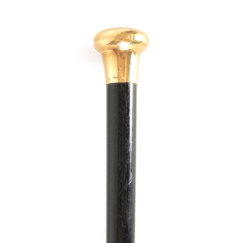 436 - A LATE 19TH CENTURY 9CT GOLD HANDLED WALKING STICK with ebonised tapering shaft - hallmarked .375 (9... 