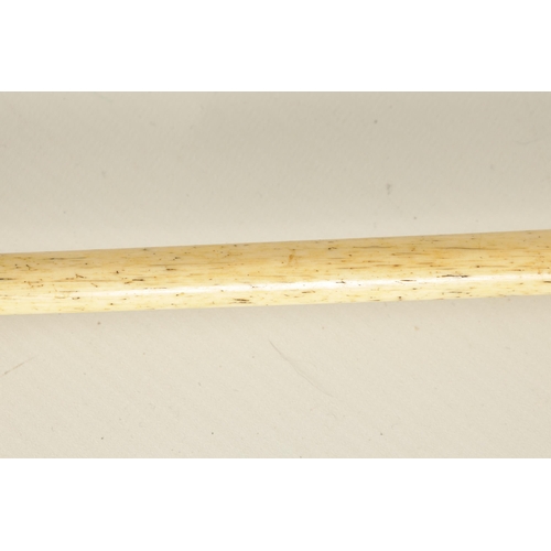 439 - A 19TH CENTURY WHALEBONE AND BALEEN BANDED WALKING STICK with sailors fist handle and tapering shaft... 