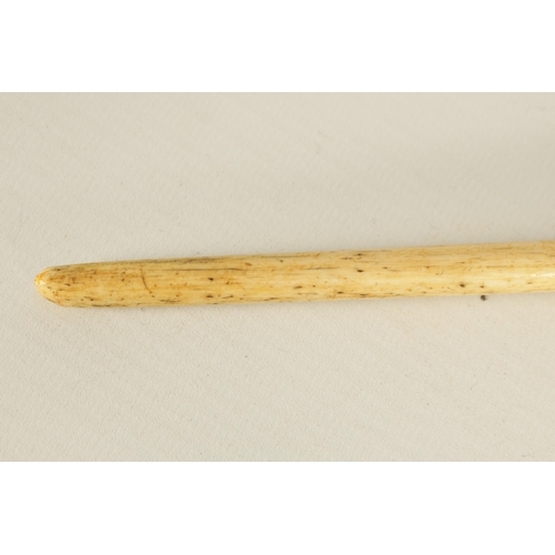 439 - A 19TH CENTURY WHALEBONE AND BALEEN BANDED WALKING STICK with sailors fist handle and tapering shaft... 