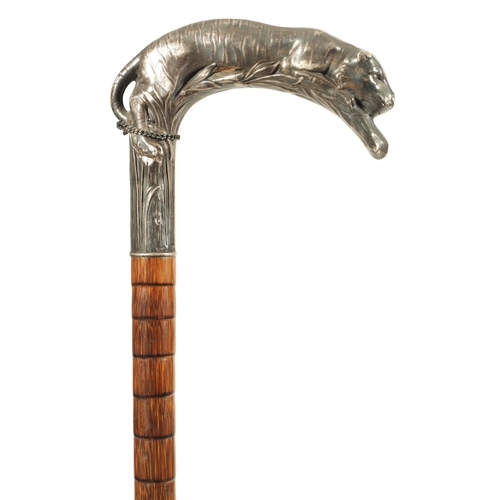 441 - A LATE 19TH CENTURY FRENCH ART NOUVEAU SILVER MOUNTED PALM WOOD WALKING STICK the handle finely mode... 