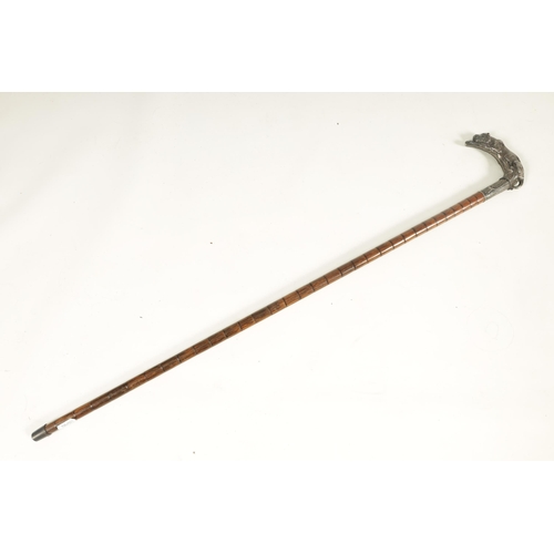 441 - A LATE 19TH CENTURY FRENCH ART NOUVEAU SILVER MOUNTED PALM WOOD WALKING STICK the handle finely mode... 