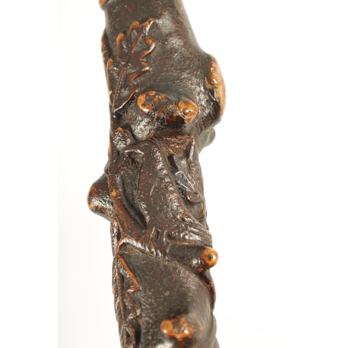 453 - A RARE 19TH CENTURY FOLK ART CARVED FRUITWOOD WALKING STICK with acorn and oak leaf carved decoratio... 