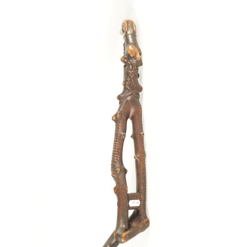 453 - A RARE 19TH CENTURY FOLK ART CARVED FRUITWOOD WALKING STICK with acorn and oak leaf carved decoratio... 