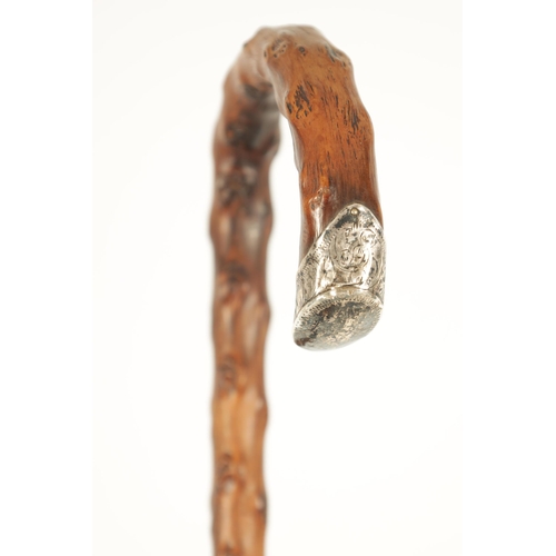 463 - TWO EARLY 20TH CENTURY WALKING STICKS comprising a silver mounted crook handled hawthorn stick toget... 