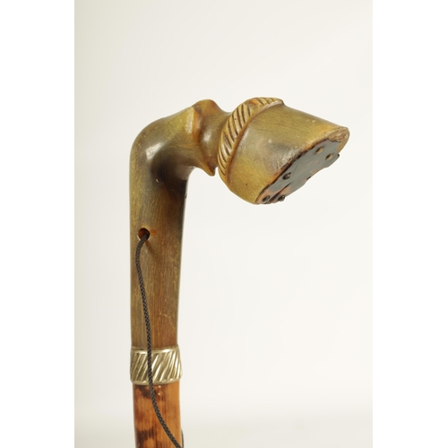 465 - A LATE 19TH CENTURY HOOF HANDLED MOUNTAINEERING STICK - POSSIBLY RHINO HORN well carved and depicted... 