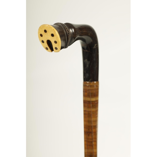 470 - A LATE 19TH CENTURY CONTINENTAL TWISTED SEGMENTED HORN HOOF HANDLED WALKING STICK (81cm overall)