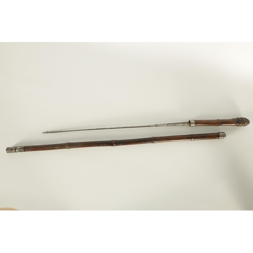 472 - A 19TH CENTURY BAMBOO SWORD STICK with root handle and tapering steel blade signed Solingen (91.5cm ... 