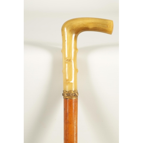 473 - A LATE 19TH CENTURY RHINOCEROS HORN HANDLED SWORD STICK the horn handle formed to simulate hawthorn ... 