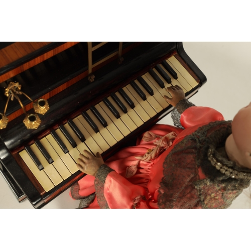 482 - A RARE 19TH CENTURY FRENCH AUTOMATON MUSIC BOX formed as a young lady playing an upright piano, the ... 