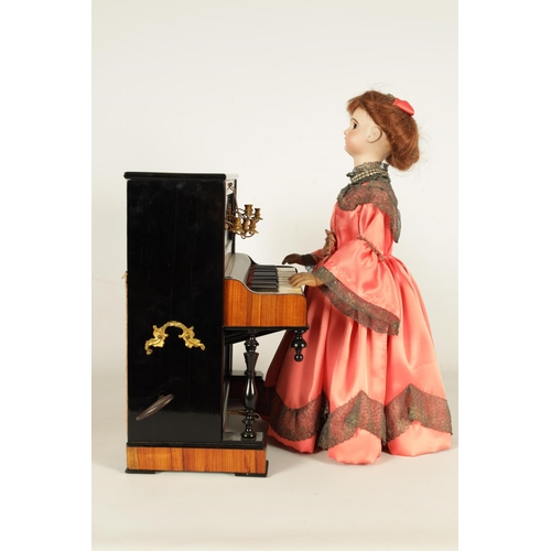 482 - A RARE 19TH CENTURY FRENCH AUTOMATON MUSIC BOX formed as a young lady playing an upright piano, the ... 