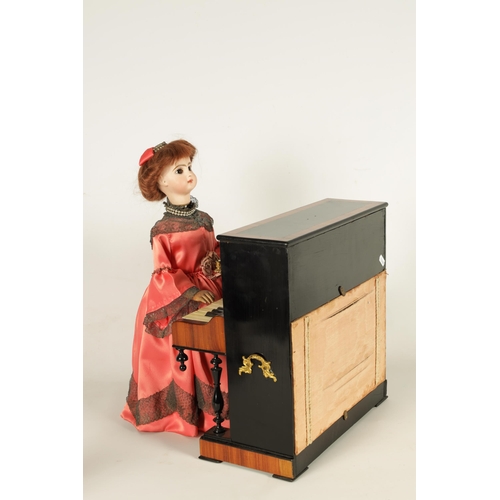 482 - A RARE 19TH CENTURY FRENCH AUTOMATON MUSIC BOX formed as a young lady playing an upright piano, the ... 