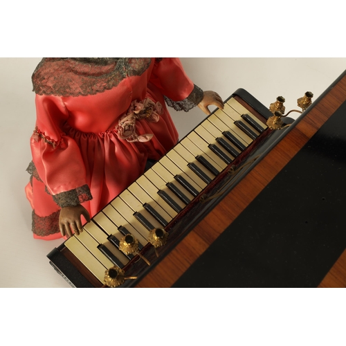 482 - A RARE 19TH CENTURY FRENCH AUTOMATON MUSIC BOX formed as a young lady playing an upright piano, the ... 