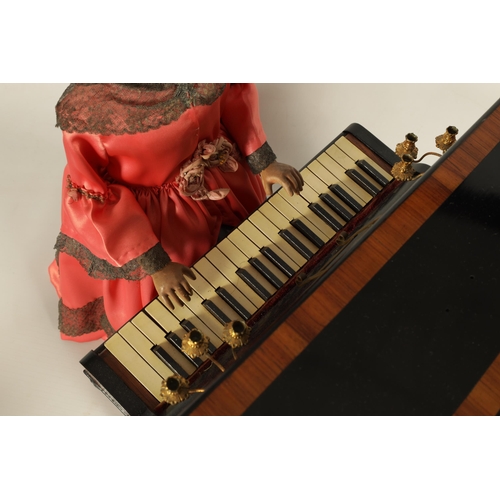 482 - A RARE 19TH CENTURY FRENCH AUTOMATON MUSIC BOX formed as a young lady playing an upright piano, the ... 