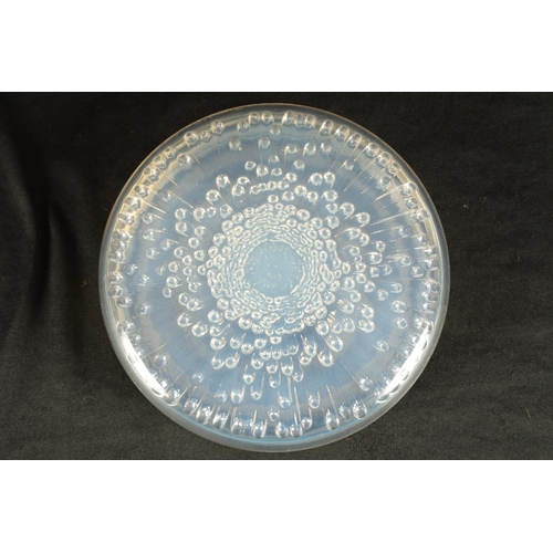 5 - A RENE LALIQUE 'TOKIO' OPALESCENT GLASS LIDDED POWDER BOX having a chrysanthemum design cover with m... 