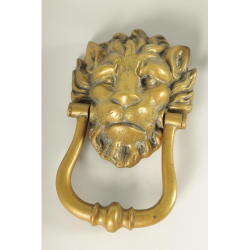 502 - A LARGE 19TH CENTURY CAST IRON 'REGENCY' DOOR KNOCKER with dogs head centre TOGETHER WITH A LARGE LI... 