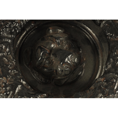 502 - A LARGE 19TH CENTURY CAST IRON 'REGENCY' DOOR KNOCKER with dogs head centre TOGETHER WITH A LARGE LI... 