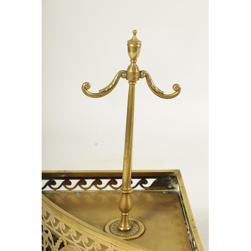 504 - A GEORGE III ADAM STYLE BOWFRONT BRASS HEARTH FENDER the shallow arched fret-cut gallery with winged... 