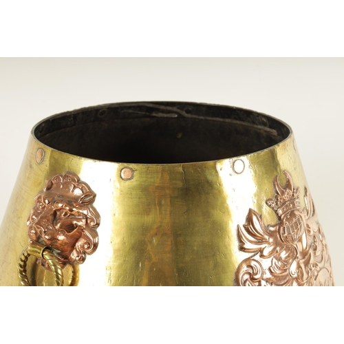 505 - A 19TH CENTURY REGENCY STYLE BRASS AND COPPER LOG BIN the rounded bulbous body on a raised foot, wit... 