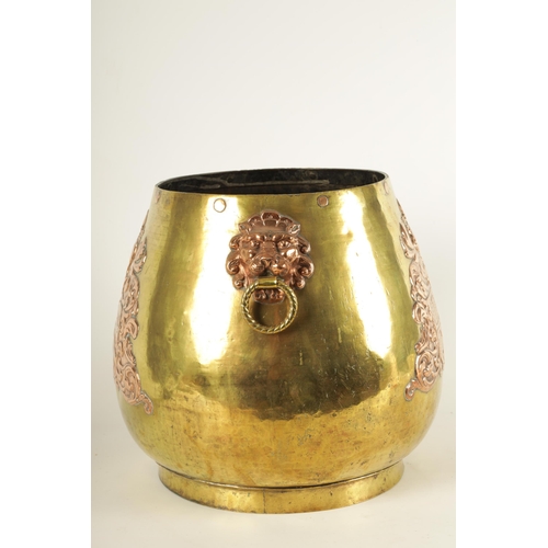 505 - A 19TH CENTURY REGENCY STYLE BRASS AND COPPER LOG BIN the rounded bulbous body on a raised foot, wit... 