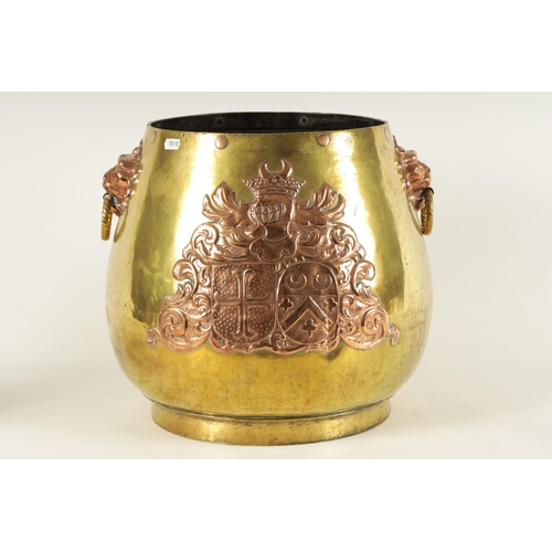 505 - A 19TH CENTURY REGENCY STYLE BRASS AND COPPER LOG BIN the rounded bulbous body on a raised foot, wit... 