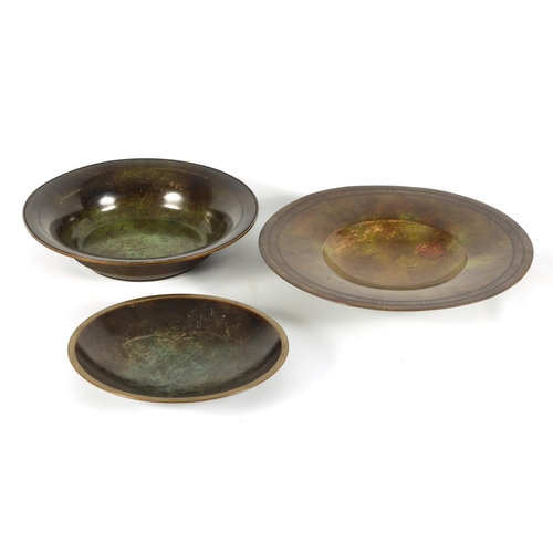 520 - A GROUP OF THREE ART DECO JUSTIN ANDERSEN, DENMARK PATINATED BRONZE DISHES of varying shape and desi... 