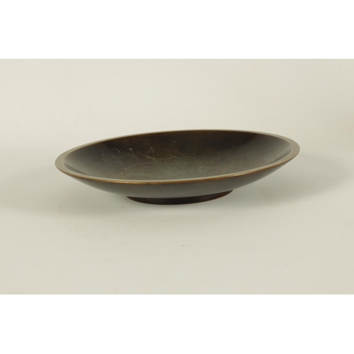 520 - A GROUP OF THREE ART DECO JUSTIN ANDERSEN, DENMARK PATINATED BRONZE DISHES of varying shape and desi... 