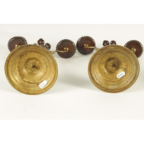 521 - ATTRIBUTED TO WILLIAM ARTHER SMITH BENSON, A STYLISH PAIR OF ARTS AND CRAFTS PATINATED COPPER AND BR... 