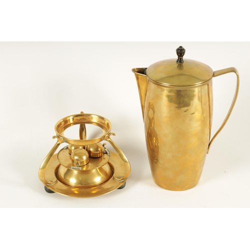 525 - A WILLIAM ARTHUR SMITH BENSON ARTS AND CRAFTS BRASS COFFEE PERCOLATOR the shaped circular base on th... 