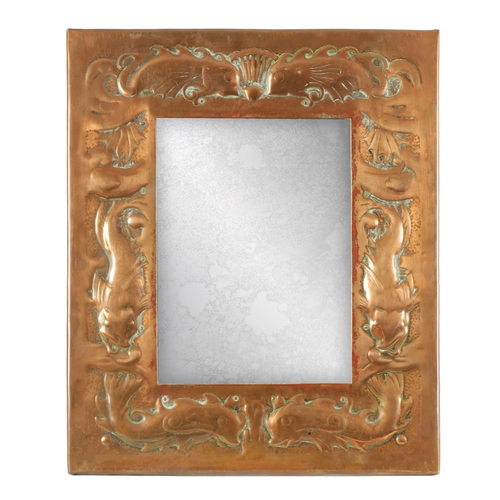 527 - AN ARTS AND CRAFTS NEWLYN SCHOOL STYLE COPPER FRAMED MIRROR probably by John Pearson, of rectangular... 