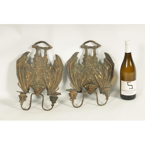 529 - A PAIR OF BRONZE HANGING BAT WALL SCONCES AFTER WILLIAM TONKS & SONS FOR LIBERTY'S designed at the K... 