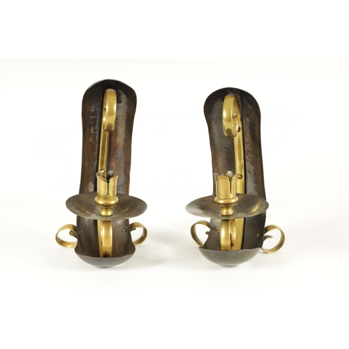 537 - ATTRIBUTED TO WILLIAM ARTHUR SMITH BENSON A STYLISH PAIR OF ARTS AND CRAFTS PATINATED COPPER AND BRA... 