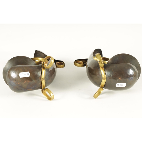 537 - ATTRIBUTED TO WILLIAM ARTHUR SMITH BENSON A STYLISH PAIR OF ARTS AND CRAFTS PATINATED COPPER AND BRA... 