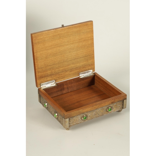 539 - A 20TH CENTURY ARTS AND CRAFT STYLE SILVER MOUNTED AND ENAMEL WORK WALNUT JEWELLERY BOX the textured... 