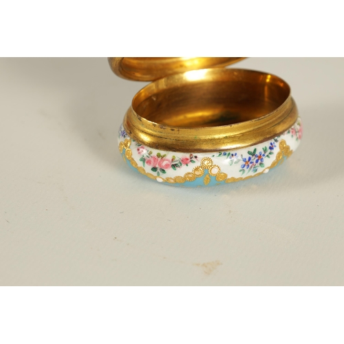 54 - AN 18TH CENTURY LIMOGES ENAMEL PORCELAIN PATCH BOX with handpainted floral decoration and gold foil ... 