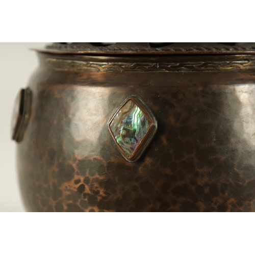 546 - AN ARTS AND CRAFTS ARTISTS GUILD PLANISHED COPPER POT-POURI BOWL AND COVER the footed rounded body s... 