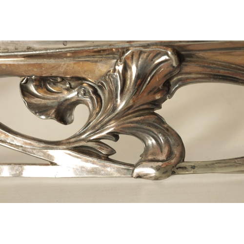 547 - AN ART NOVEAU WMF SILVER PLATED DRESSING TABLE MIRROR of shaped form with figural leaf and floral fr... 