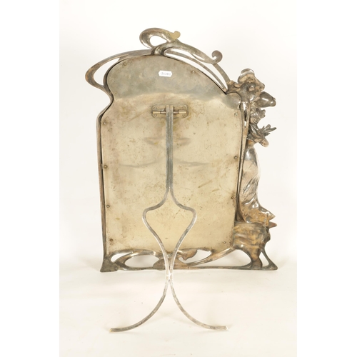 547 - AN ART NOVEAU WMF SILVER PLATED DRESSING TABLE MIRROR of shaped form with figural leaf and floral fr... 