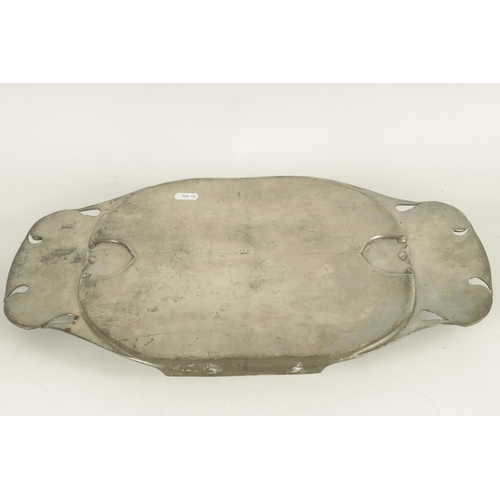 548 - A STYLISH LIBERTY TUDRIC PEWTER TWO-HANDLED OVAL TRAY with riveted and pierced shaped sides enclosin... 