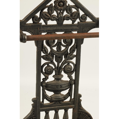 549 - A LATE 19TH CENTURY CAST IRON COALBROOKDALE STYLE UMBRELLA/STICK STAND with rectangular stepped tray... 