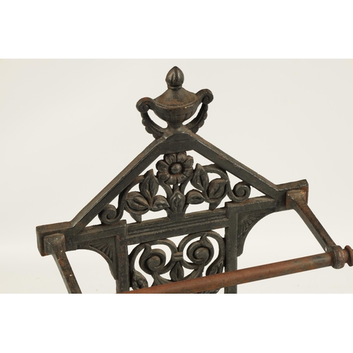 549 - A LATE 19TH CENTURY CAST IRON COALBROOKDALE STYLE UMBRELLA/STICK STAND with rectangular stepped tray... 