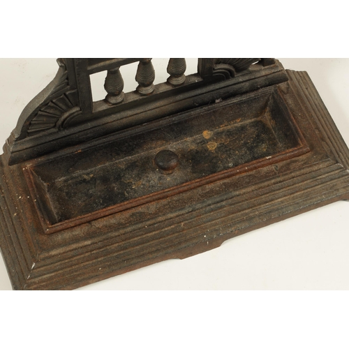 549 - A LATE 19TH CENTURY CAST IRON COALBROOKDALE STYLE UMBRELLA/STICK STAND with rectangular stepped tray... 