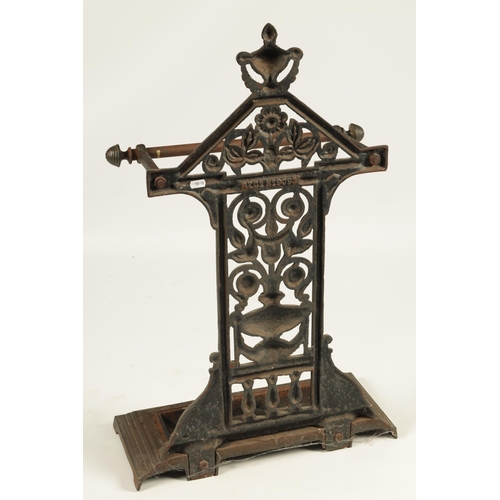 549 - A LATE 19TH CENTURY CAST IRON COALBROOKDALE STYLE UMBRELLA/STICK STAND with rectangular stepped tray... 