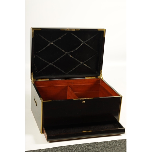 557 - A MASSIVE 19TH CENTURY BRASS MOULDED CALAMANDER DESPATCH BOX with sunken brass side handles and bras... 