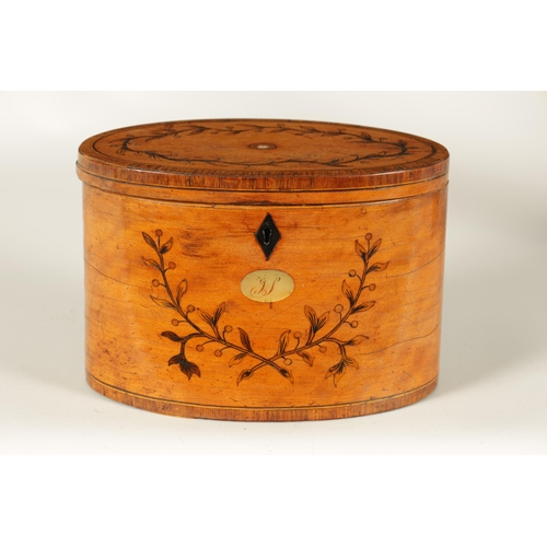 560 - A GEORGE III INLAID SATINWOOD OVAL SHAPED TEA CADDY with crossbanded edges and branchwork inlays. (1... 